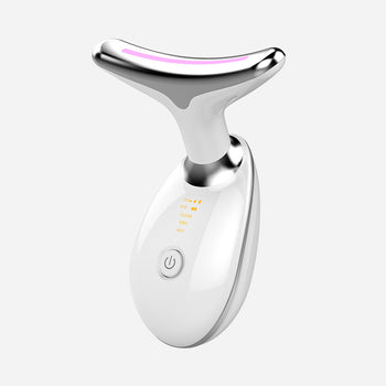 White facial beauty massager with purple light shown at the head